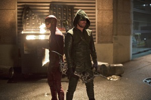 The Flash -- "Flash vs. Arrow" -- Image FLA108c_0157b -- Pictured (L-R): Grant Gustin as The Flash and Stephen Amell as The Arrow -- Photo: Diyah Pera /The CW -- ÃÂ© 2014 The CW Network, LLC. All rights reserved.